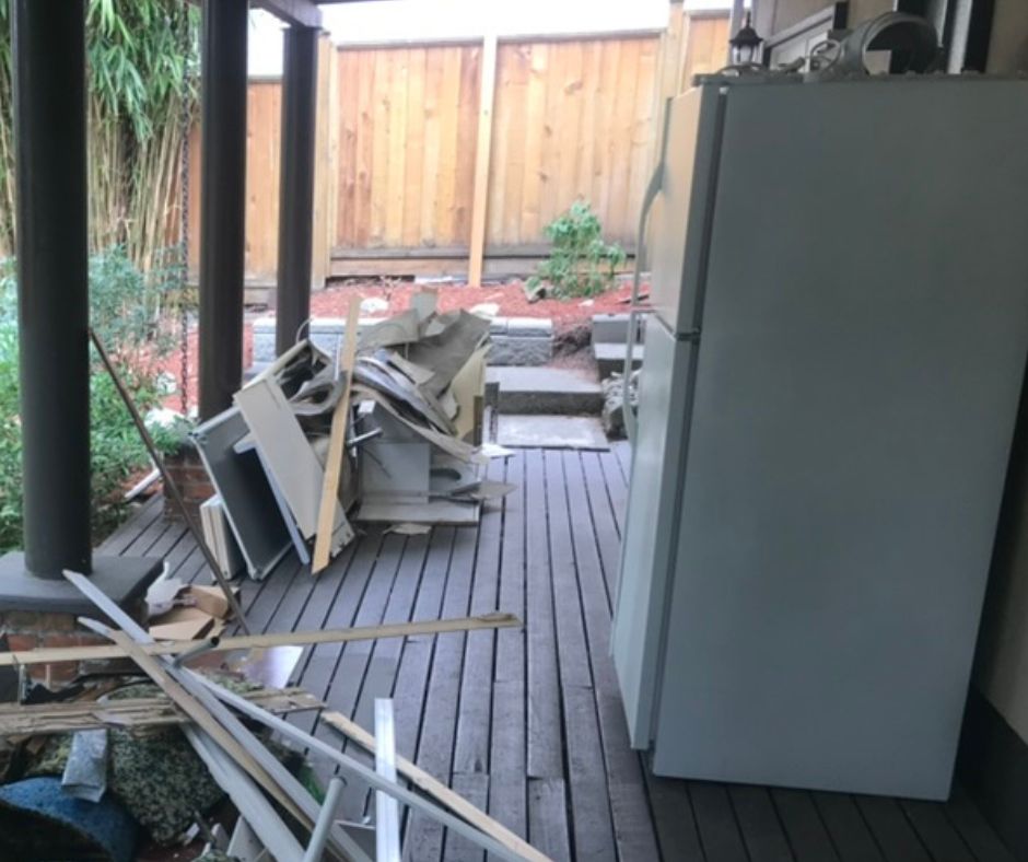 Photo of area after Wood pallets and construction debris removed from residential property